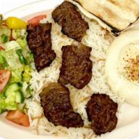 Beef Shish Kabob Plate · Five pieces of charbroiled flap meat. Kabob and shawarma plates come with hummus, salad, ric...