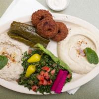 Veggie Plate · Vegetarian. Tabouli, hummus, baba ghanouj, grape leaves, and falafel. Kabob and shawarma pla...