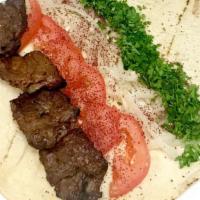 Beef Shish Kabob Wrap · Served with parsley, onion, tomato, and sumac.