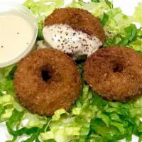 Falafel Order ( 4 Pieces ) · Vegetarian. Fried smashed garbanzo with garlic and spices.