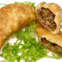 Sambousik Order ( 2 Pieces ) · Ground beef, sauteed onions, and spices stuffed in dough and fried.