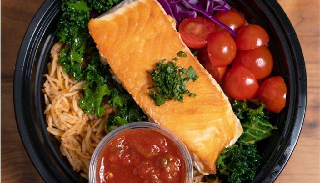 Salmon Taco Bowl · Grilled salmon and rice flavored with taco seasoning. Topped with kale in light olive oil dressing, cherry tomatoes, purple cabbage, and cilantro. Served with salsa