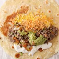 Super Burrito · Carne asada, guacamole, pico de gallo, sour cream, cheese, rice and beans.