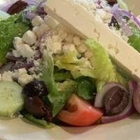 Greek Salad · Lettuce, tomato, cucumber, red onion, olives, feta cheese and Italian dressing.