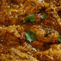 Pepper Chicken Curry · Chicken sautéed with onion, Chettinad spices and crushed black pepper.