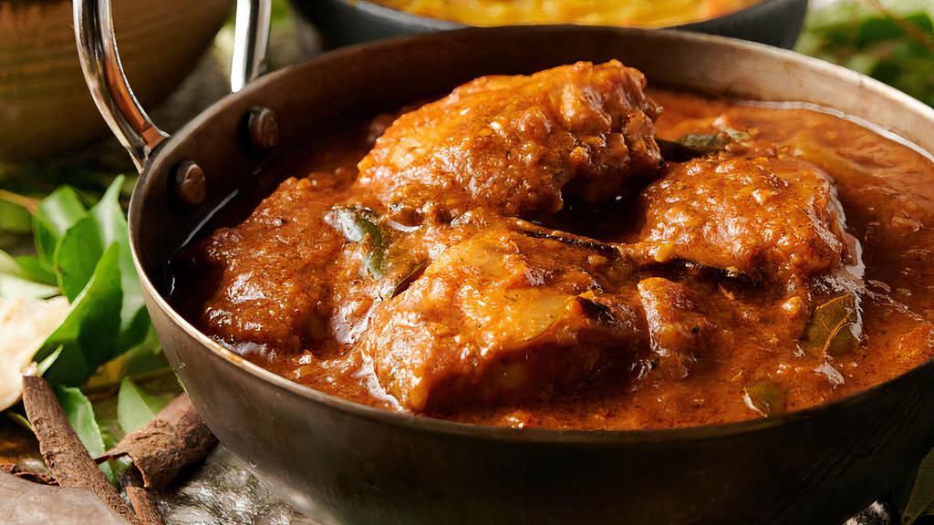 Chettinad Chicken Curry · Tamil Nadu favorite chicken cooked in South Indian style, coconut based gravy.