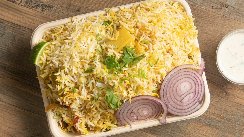 Hyderabadi Vegetable Dum Biryani · Medley of green vegetables, basmati rice desi ghee, curd and endless spices.