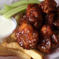 Wings  · Tossed in your choice of sauce and served with ranch dressing.