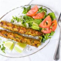Seekh Kabab (Chicken) (Two Pieces) · Ground chicken lightly spiced & mixed with herbchar grilled on a skewer.