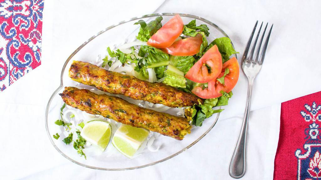 Seekh Kabab (Chicken) (Two Pieces) · Ground chicken lightly spiced & mixed with herbchar grilled on a skewer.