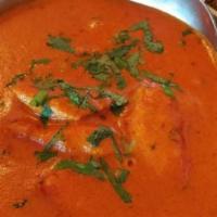 Butter Chicken · Boneless chicken Thai baked in day oven & cooked in a butter sauce.