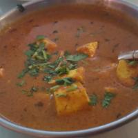 Shahi Paneer · Deep fried cheese cooked with mildly spices and butter sauce.
