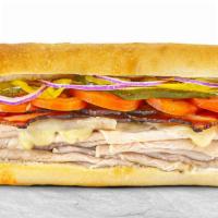 Turkey & Bacon · Turkey breast, bacon slices, and Jack cheese melted together.  Comes with THE WORKS!