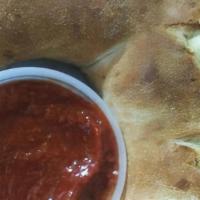 Calzone · Filled with ricotta and mozzarella cheese.