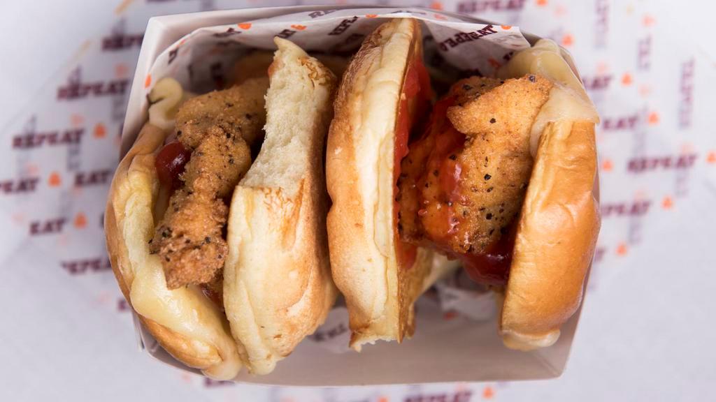Crispy Chicken Sliders · Crispy chicken served shaq's way, American style Colby cheese, and ketchup.