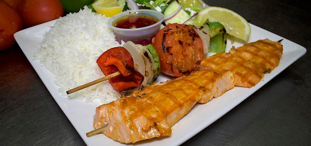 Salmon Kabob · Served with two sides, pita bread and a veggie skewer.