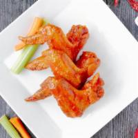 Wing Appetizer · Three golden-fried whole wings, tossed in. one of our 14 signature house made sauces, or nak...