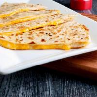 Cheese Quesadilla · Cheddar and Jack cheese melted to perfection. inside of a 14” tortilla.