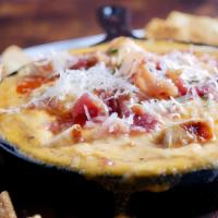 Buffalo Chicken Cheese Dip · A mouth watering combination of our house made buffalo sauce, cream cheese, five cheese sauc...