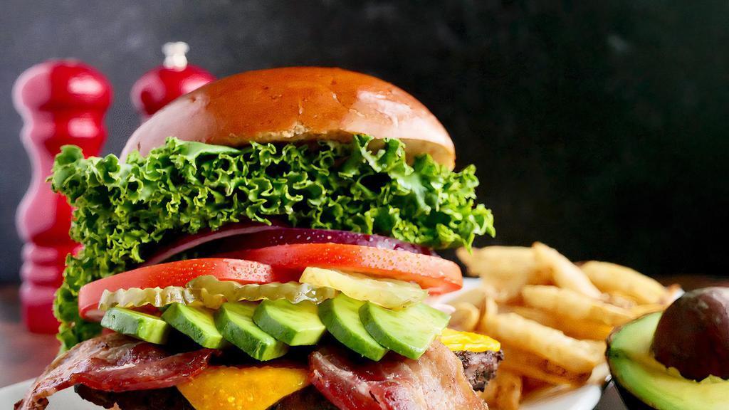 Abc Burger · A hefty gourmet  charbroiled Angus patty. hand prepared, Avocado, Apple wood bacon, Cheddar. cheese, Green leaf lettuce, onions, tomatoes, pickles,. mayo. Served on a Brioche Bun W/French fries.