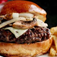 Mushroom Swiss Burger · A hefty gourmet  charbroiled Angus patty,. hand-prepared and served with sautéed. mushrooms,...