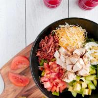 Cobb Salad · Chopped grilled marinated chicken breast, hard-boiled egg, bacon, shredded cheese, tomatoes,...