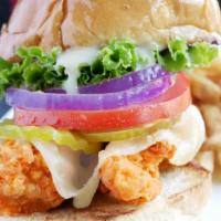 Crispy Chicken Sandwich · Two crispy breaded chicken breast, with lettuce, tomatoes, pickles, onions, mayo and Pepper ...