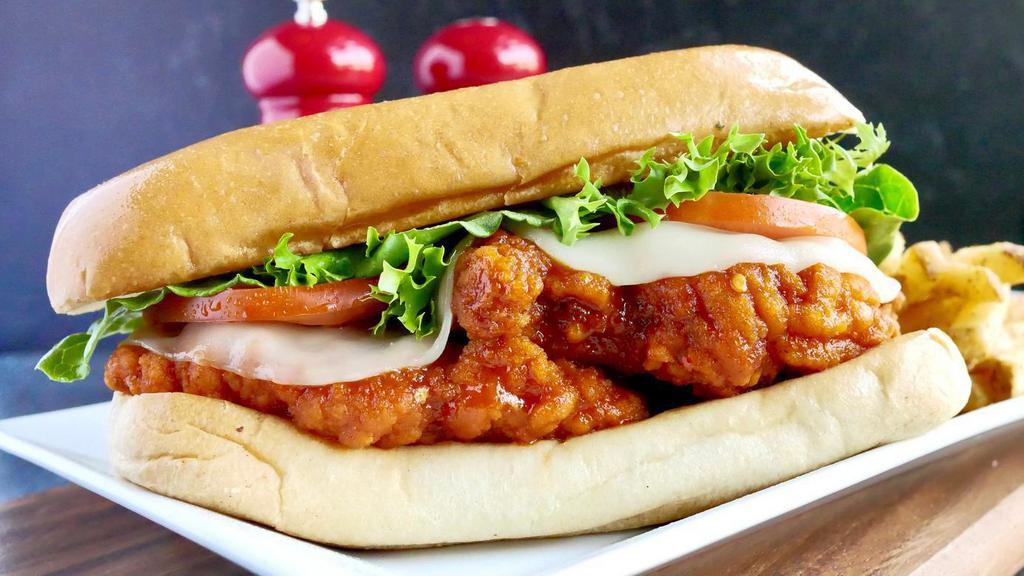 Buffalo Rooster · Crispy breaded chicken breast, tossed in Buffalo sauce topped with Provolone cheese, lettuce and tomatoes. Served on a Brioche Hoagie W/French fries.