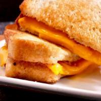 Grilled Cheese · Two slices of thick sliced Country white bread, with American cheese in the middle, grilled ...