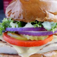 Grilled Chicken Sandwich · Grilled marinated chicken breast, topped with Pepper Jack cheese, lettuce, tomatoes, pickles...