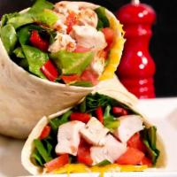 Chicken Wrap · Grilled marinated chicken breast, roasted bell peppers, lettuce, tomatoes and shredded chees...