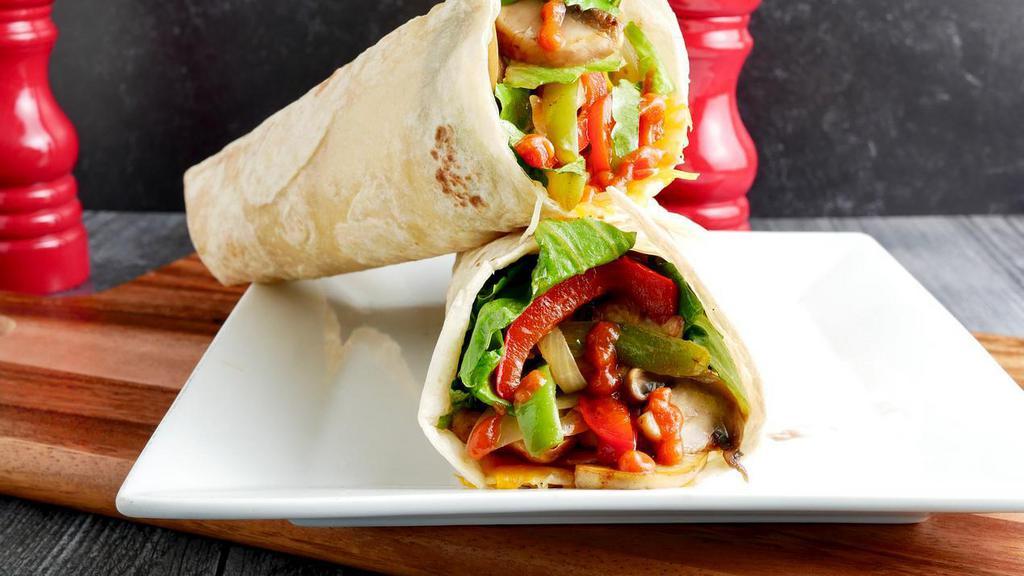Veggie Wrap · Sauteed mushrooms, onions, tomatoes, roasted bell peppers, shredded cheese, chopped Romaine, marinara sauce wrapped in 14
