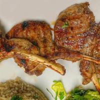 Lamb Chops · Tender marinated lamb chops grilled to perfection. Served with choice of side.