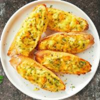 Garlic Melts Bread · (Vegetarian) Housemade bread toasted and garnished with butter, garlic, mozzarella cheese, a...
