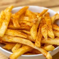 Cajun Fries · Crispy French fries tossed in Cajun seasoning.