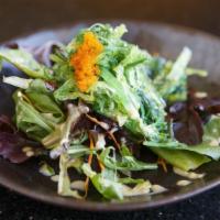 Seaweed Salad · Seasoned seaweed on top of spring mixed green with moo dressing and smelt egg on top.