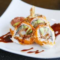 The Tiger Roll · Fresh shrimp tempura topped with boiled shrimp and avocado with sweet chili aioli sauce.