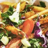 Masala Fries · Fries served with creamy masala sauce, optionally garnished with cilantro, green onions, and...