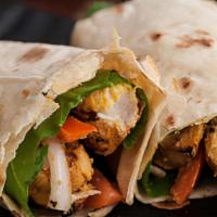 Grilled Chicken Tikka Wrap · Chicken grilled in a Tandoor, served on a tortilla with lettuce, tomato, cilantro, cucumbers...