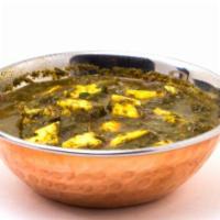 Saag Paneer · Spinach cooked with cubes of paneer cheese Served with Basmati rice.  
(  vegetarian & glute...