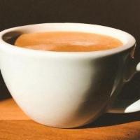 Arabica Coffee · Arabica, smooth coffee blend served with cream and sugar.