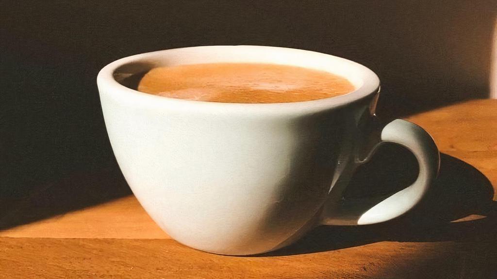 Arabica Coffee · Arabica, smooth coffee blend served with cream and sugar.