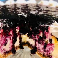 Our Famous Blueberry Cheesecake · Rich and creamy cheesecake with fresh and sweet blueberry topping.