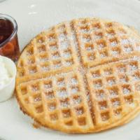 Waffle · A delicious homemade waffle, topped with powdered sugar