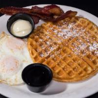 Waffle Combo · Choice of two bacon strips or one sausage with a waffle and two eggs.