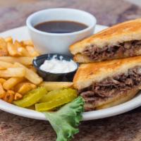Cappy'S Grilled Prime Rib Melt Au Jus · Thin sliced prime rim and melted swiss cheese on grilled sourdough served with au jus and cr...