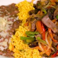 Fajita Plate Steak · With rice, beans, cheese, pico de gallo, guacamole, sour cream, chips and salsa and corn or ...