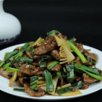 Mongolian Beef · spicy. sliced beef, garlic, green onions, bamboo shoots, spicy soy sauce