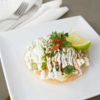 Sopes (2) Plate · Choice of meat, topped with beans, lettuce, cotija cheese, sour cream, and pico de gallo.