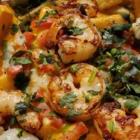 Shrimp Fries · Shrimp, beans, nacho cheese, sour cream, pico de gallo, guacamole